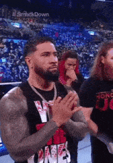 Trying Not To Laugh Wwe GIF - Trying Not To Laugh Wwe Jey Uso GIFs