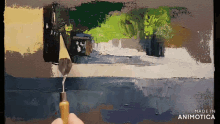 a painting is being painted with a spatula and the words made in animotica are on the bottom right