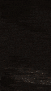 a close up of a fire with a black background