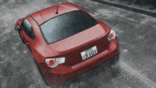a red car with a license plate that says 9 101