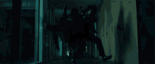 a person is crawling through a dark hallway in a dark room .
