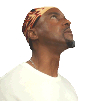 a man wearing a headband with the letter s on it smiles