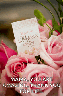 a bouquet of pink roses with a card that says happy mother 's day on it
