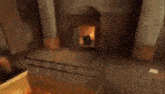 a fire is coming out of a hole in a wall in a room .