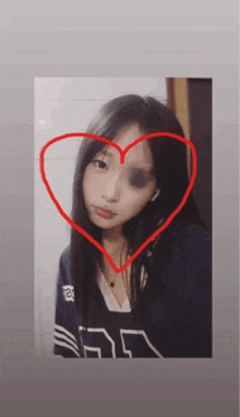 a girl with a black eye and a heart around her