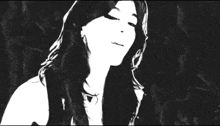 a black and white drawing of a woman 's face with smoke coming out of her mouth