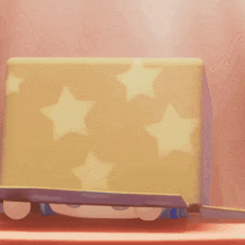 a cartoon character wearing a yellow hat with stars on it
