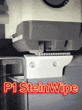 a sticker that says p1 steinwipe on it next to a machine