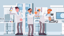 a group of scientists are standing in a lab with their arms in the air .