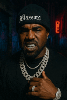 a man wearing a black beanie with blazzard written on it