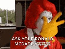 a mcdonald 's mascot covering his face with his hand and the words ask your ronald mcdaddy