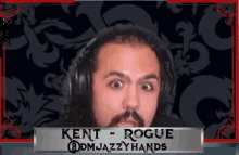 a man wearing headphones with kent rogue @dmjazzyhands written on the bottom