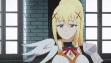 a blonde anime girl with wings and a bow on her chest