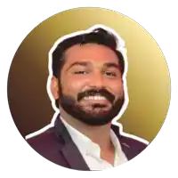 a man with a beard and mustache is smiling in a gold circle