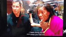 a tv screen shows a man and a woman and the woman says i been doing this *** when you met me