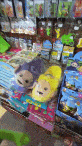 a display of teletubbies slippers and other toys