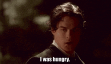 a man in a suit and tie is saying now i am not hungry