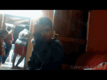 a blurred image of a group of people with cyberlink written on the bottom right