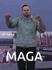 a man is dancing in front of a maga sign