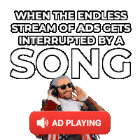 a man is wearing headphones and holding a music playing box