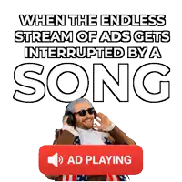 a man is wearing headphones and holding a music playing box