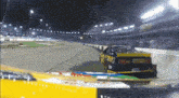 a race car that says heavy duty truck parts on the side