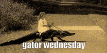 a woman is riding on the back of a large alligator with the words gator wednesday below her