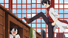 a man is kicking another man in the face