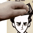a close up of a person 's head with a hand on it .