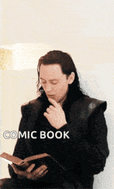 Loki Reading GIF - Loki Reading Read GIFs