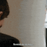 a man says remind me to move while looking at something