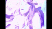 a woman with a surprised look on her face is in a purple and blue background