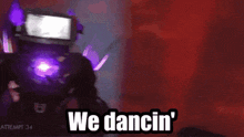 a robot wearing a virtual reality headset says " we dancin ' "