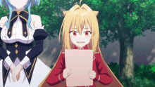 a girl is holding a piece of paper in her hands
