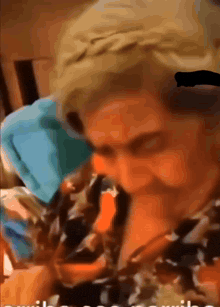 a blurry picture of a person 's face with the words " i 'm sorry " in the corner