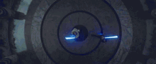 a man is holding a light saber in his hand while standing next to another man .