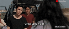 a group of people standing in front of a car with the caption grow up lah sia