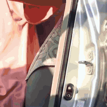 a close up of a car door with a sticker on it that says ' toyota '