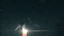 a rocket is being launched into space with a huge explosion behind it