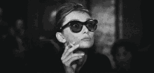 Audrey Hepburn Smoke GIF - Audrey Hepburn Smoke Shades GIFs