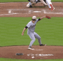 a baseball player wearing a jersey that says lm on it