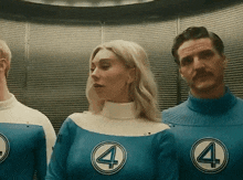 a man and a woman are standing next to each other wearing blue uniforms with the number 4 on them