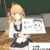 a girl is holding a white board with a drawing of a face on it