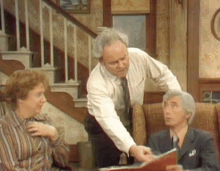 Archie Bunker Scares Whitehead All In The Family GIF - Archie Bunker Scares Whitehead All In The Family GIFs