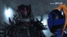 a purple monster with the word rider on the bottom