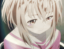 a close up of a girl with tears on her face