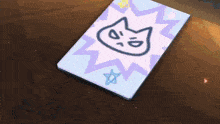 a drawing of a cat on a piece of paper