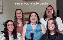 a group of young women are singing into microphones .