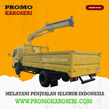 a yellow truck with a crane on the back and the website promo karoseri.com