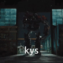 a man in a black jacket is holding a bat and the word kys is on the bottom